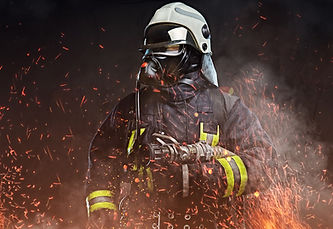 Firefighter in full gear representing the demanding physical resilience and endurance that men's testosterone optimization therapy at Hankins Hormonal Health Ohio can support