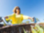 cheerful woman on a bike