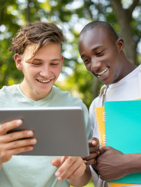 Gen Z students looking at tablet