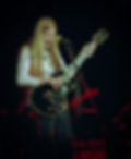 Gregg Allman playing his black Gibson Les Paul Custom at the Shrine Auditorium LA 1974 – vintage concert photography print