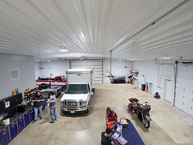 Auto Additions team working together in the shop in Springfield, IL