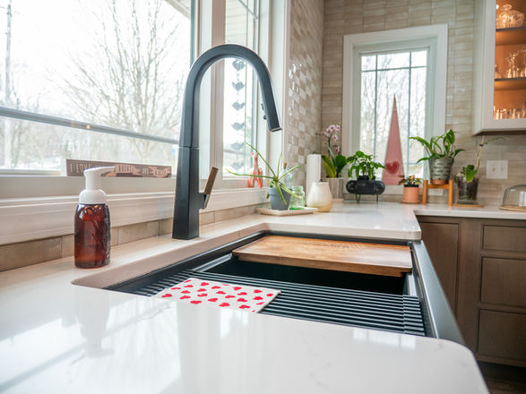 Beautiful black and natural wood sink installed by Capitol Kitchen and Bath in Springfield, IL