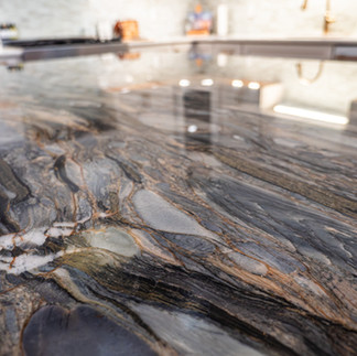 Luxurious kitchen remodel project at Capitol Kitchen and Bath in Springfield, IL including sleek quartz countertops