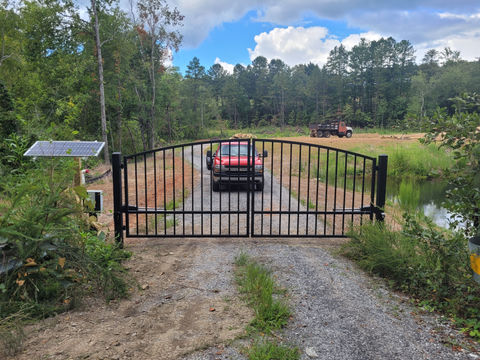 Automatic gate with solar-powered gate opener in Hayesville, NC