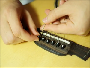 Learn to Change Strings on Your Acoustic Guitar