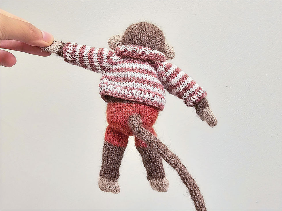 Thumbnail: Dressed Monkey Toy - Knitting Pattern