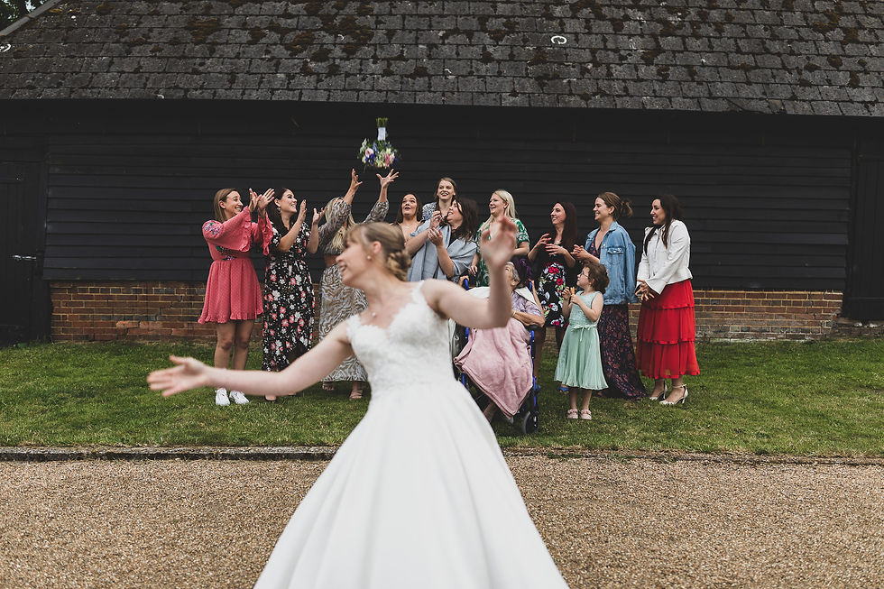 Bouquet Throw at The Sussex Barn, Hellingly, Wedding photography by Steve and Tania Photography, Sussex based wedding photographers