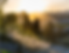 Skyline of the sun setting on the back of an old city