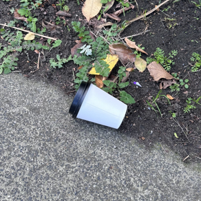 Littered takeaway coffee cup