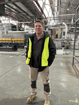 Brad in factory.jpg