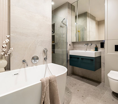 modern-bright-bathroom-with-lamella-wall-big-white-bath-with-silver-faucet-brown-towel-was