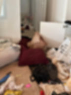 Pillow soaked in blood in a demolished home