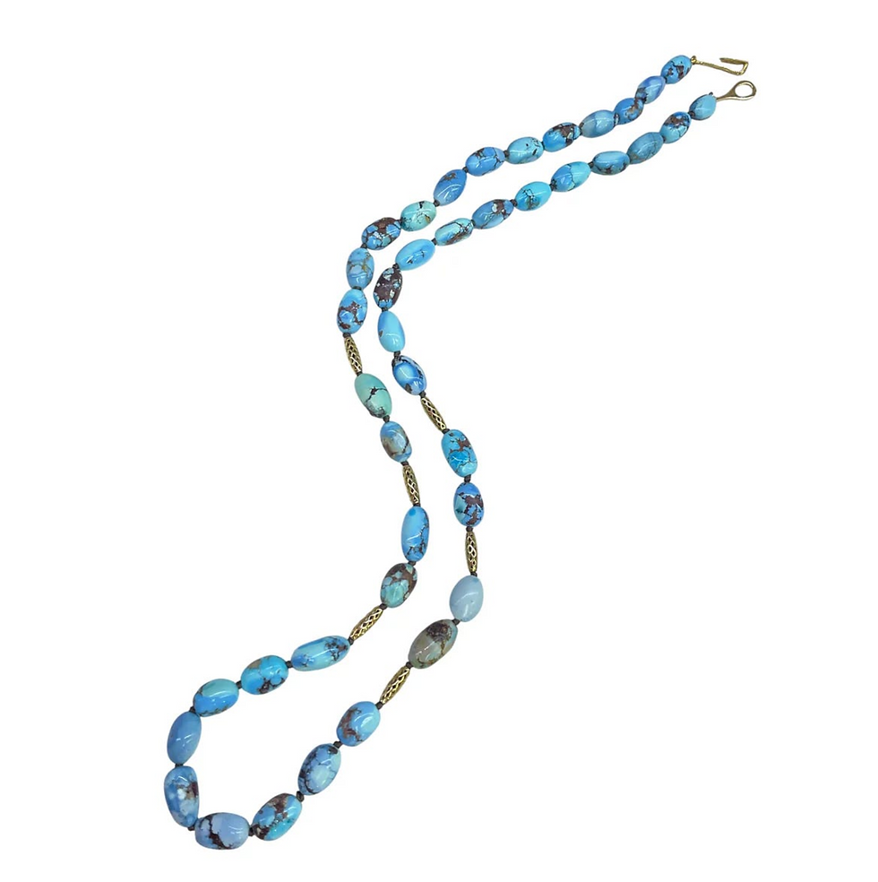 Golden Hill Turquoise beaded necklace with 18k yellow gold Crownwork® barrel beads, $6,875; Ray Griffiths
