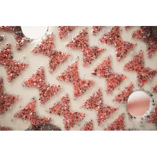 Close up of Mirka Ultimax Ligno grit on sandpaper