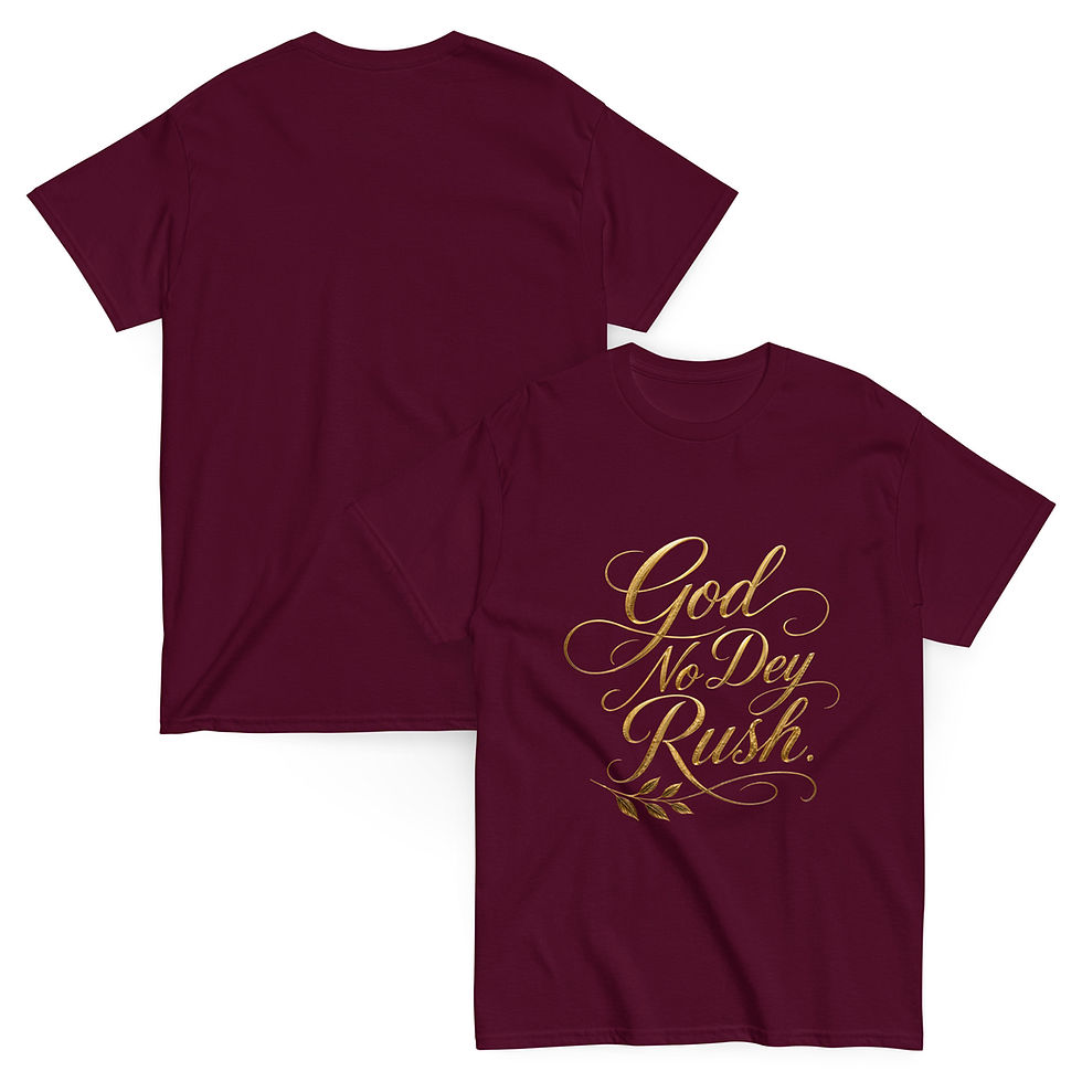 High angle view of a folded T-shirt with "God No Dey Rush" printed on it