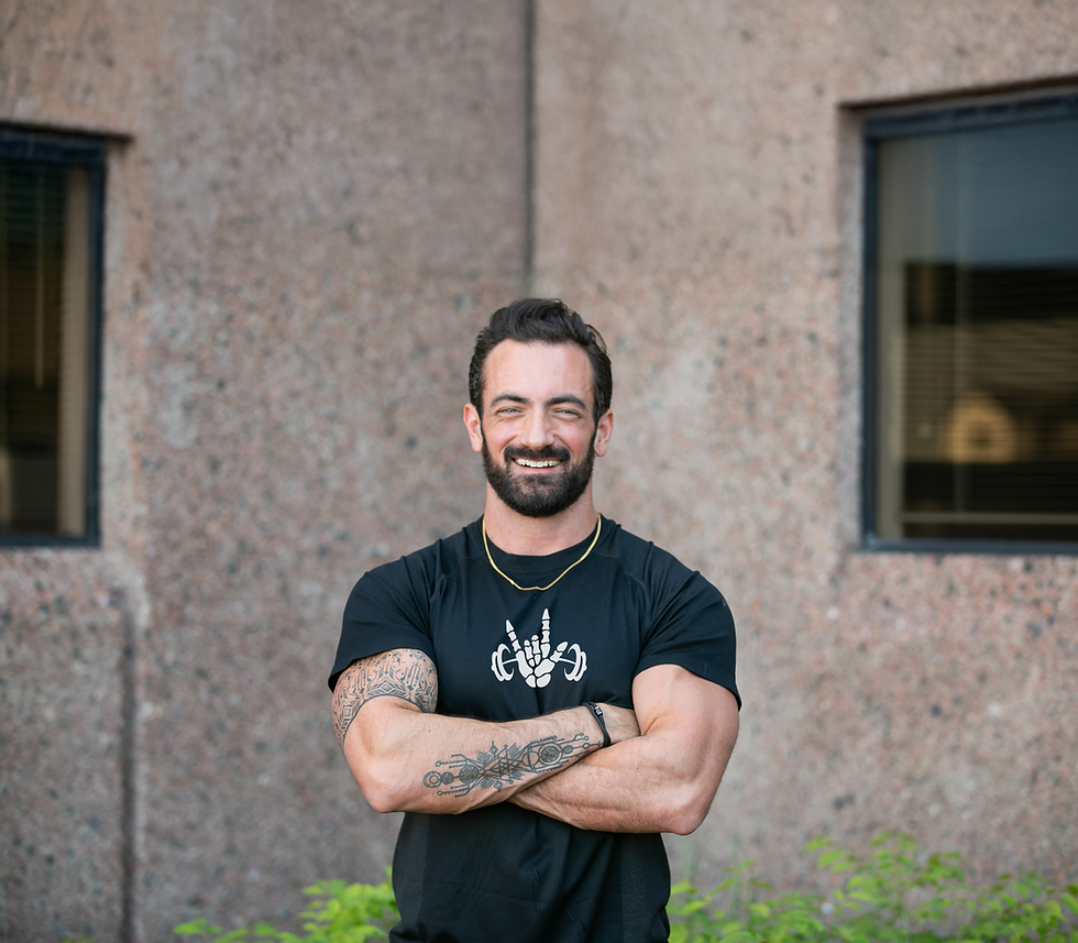 Denver personal trainer standing with his branding