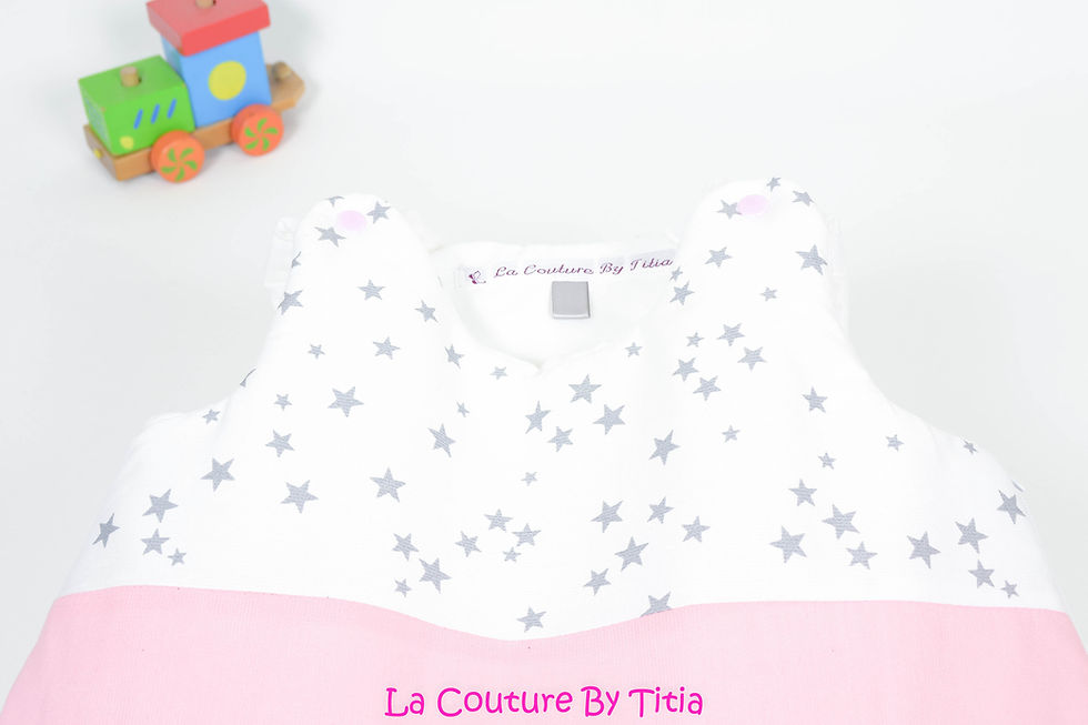Thumbnail: Turbulette gigoteuse 0/6 mois pluie d'étoiles gris uni, blanc et étoiles rose