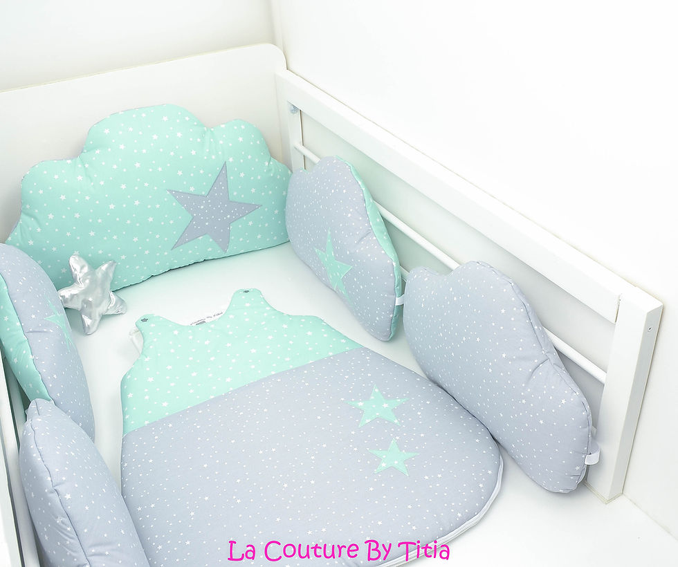 Thumbnail: Cloud bed bumper and gray sleeping bag and sea green stars