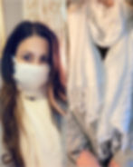 side by side images showing a woman wearing a face mask that is sewn into a scarf next to the same scarf wrapped around her neck with the mask hidden