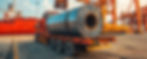 Steel coils on a flatbed truck.