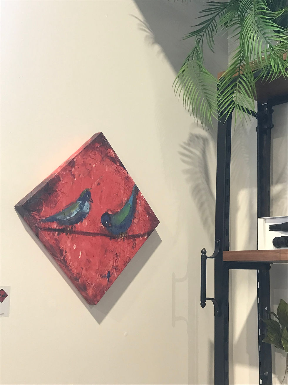 Thumbnail: Love Birds Art Print hung diagonally next to industrial chic shelf