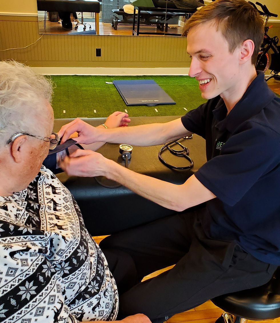 Eye-level view of physiotherapy clinic treatment room with exercise equipment