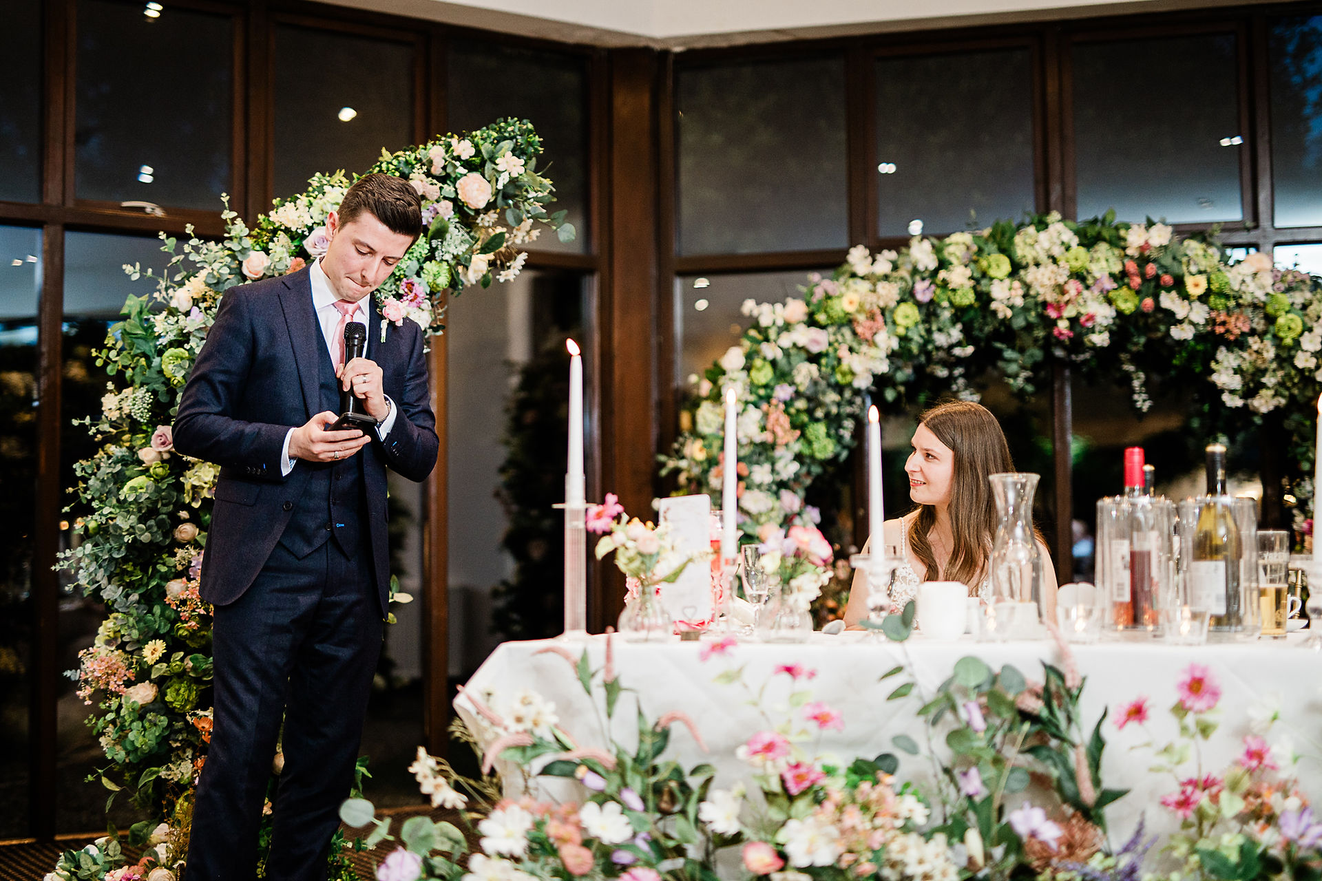 grooms speech while the bride looks at him