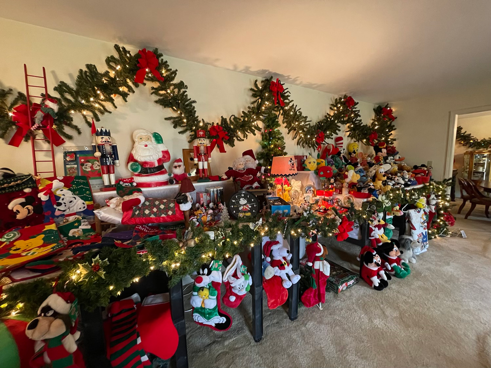 a room filled with lots of christmas decorations including a nutcracker