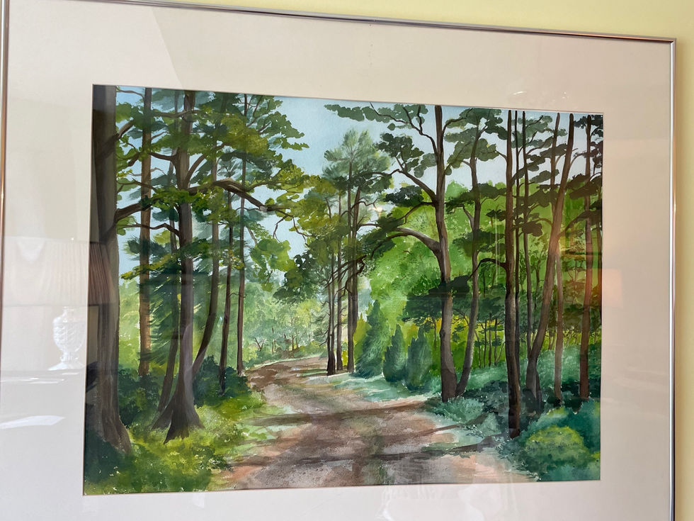 a watercolor painting of a path through a forest