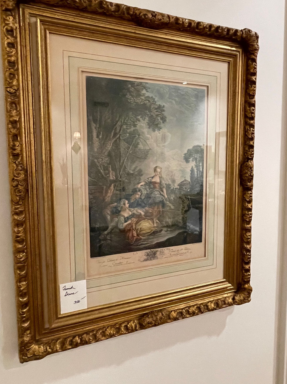 a framed painting has a tag on it that says aunt donna