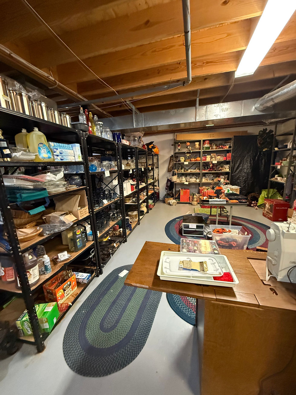 a room filled with lots of shelves including a box of kraft macaroni and cheese