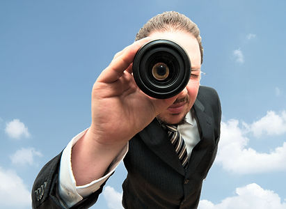 man peeping through monocular_edited.jpg