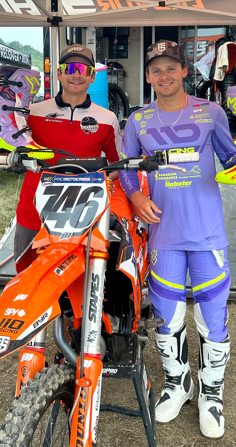MxBoot.com owner with sponsored rider Trevor Schmidt at the track showcasing Alpinestars motocross boots