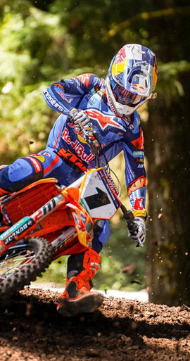 Chase Sexton wearing bright orange Alpinestars Tech 10 Supervented Mx Boots from the MX26 collection — premium motocross boots for serious dirt bike riders.