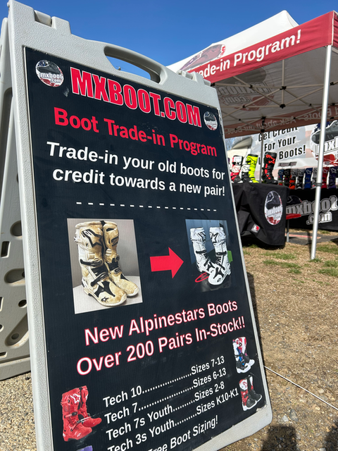 Trade-in program sign at mxboot.com trackside display