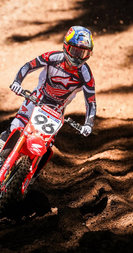 Hunter Lawrence riding at Washougal in the Alpinestars MX26 gear set and motocross boots — high-performance dirt bike gear in real race conditions.