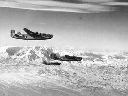 B-24_Liberator_over_the_Alps_Austria_january_1945.jpg