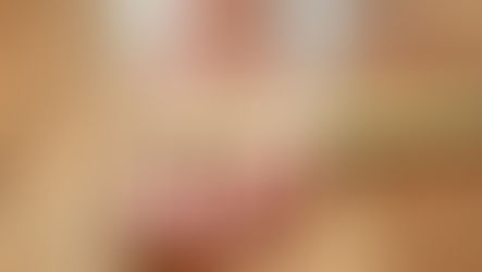 Close-up of measuring foot length with a ruler on a wooden floor!