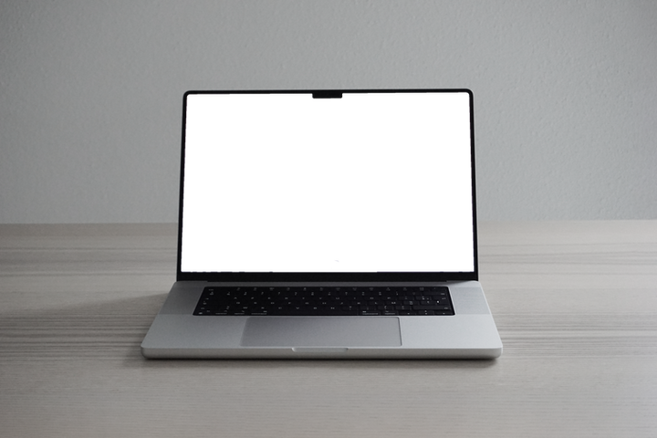 Free Silver MacBook Pro on Desk Mockup.png