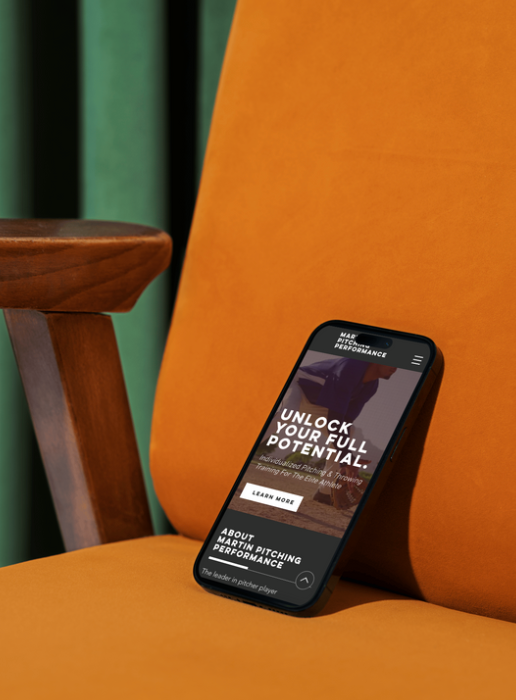 Smartphone displaying 'Unlock Your Full Potential' website