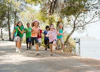 children learning outdoors and having fun