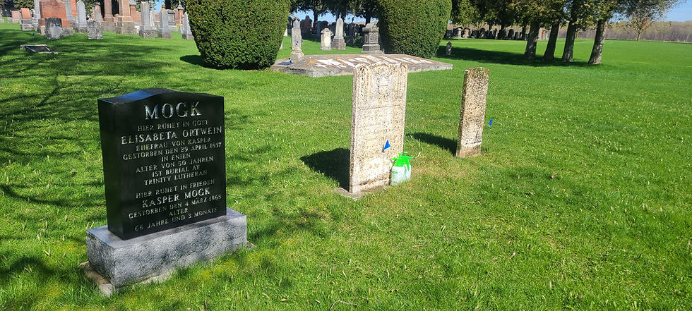 The Trinity Restoration project has begun. Eternal Care Stone Services cleans the oldest stones in Row 1 of the cemetery. While discussing the community members that rests there.