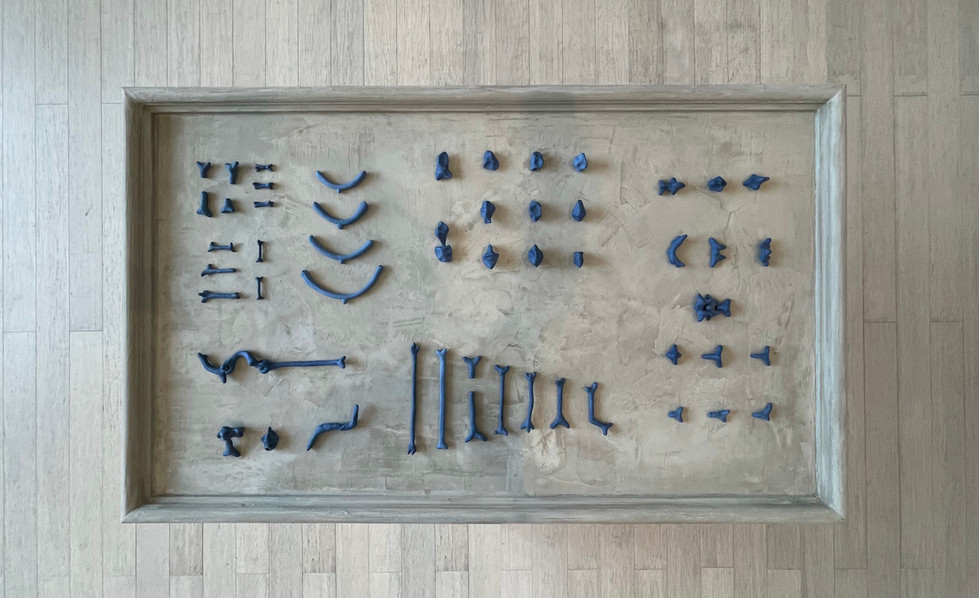 Making of a _______, 2021, Steel, wood, cement, porcelain, and mason stain, 34 x 60 x 36 inches