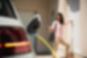 lady charging electric car