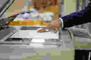 Employee using copy machine