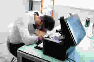 Man frustrated by broken printer