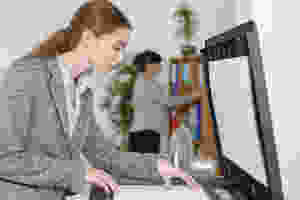 Employee Using Copier Machine