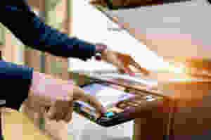 Pressing Button on Printer