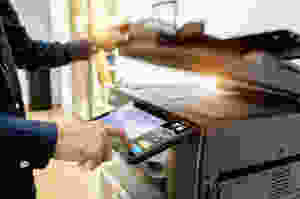 Man Using Copier
