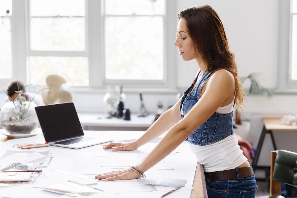 Woman working at standing desk